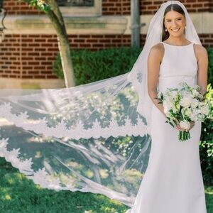 Lace trimmed cathedral length veil - with blusher. Great condition.